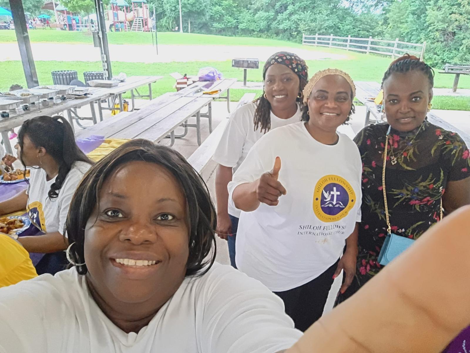 Women of Shiloh Fellowship gathered at a community event